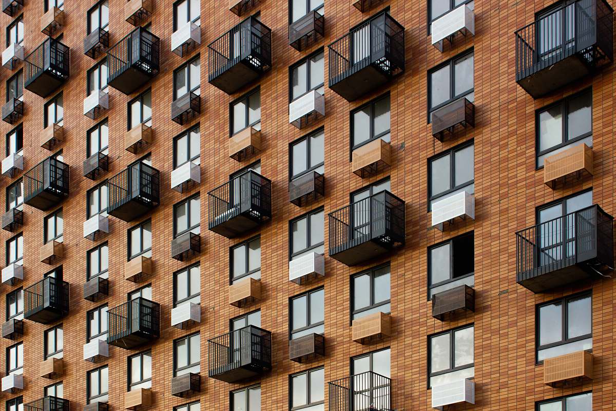 high rise brown and black building urban